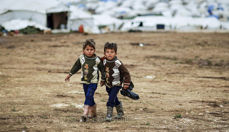 Barn på flukt i Syria. Foto: Flickr